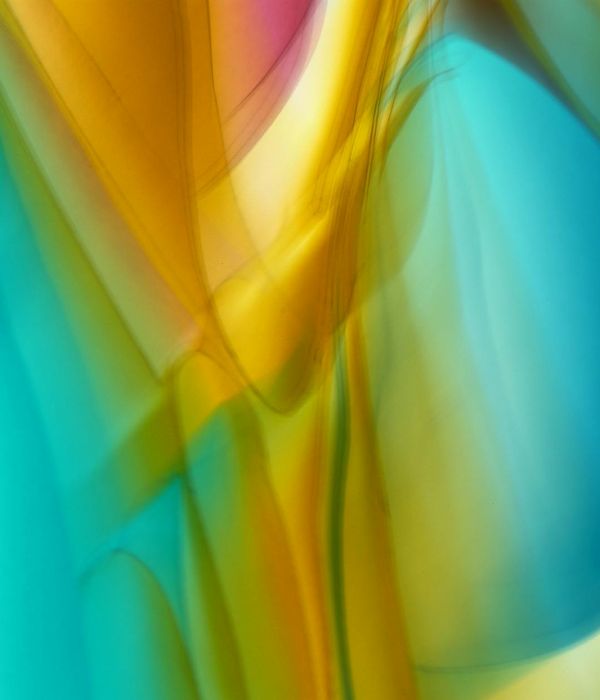 Person feeling vibrant and energetic with a bright aquamarine aura.